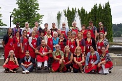 Un photo de groupe d’un symposium